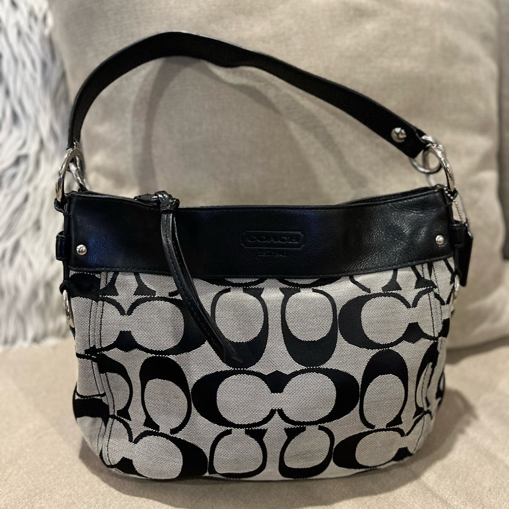 Coach signature leather/fabric black purse.
